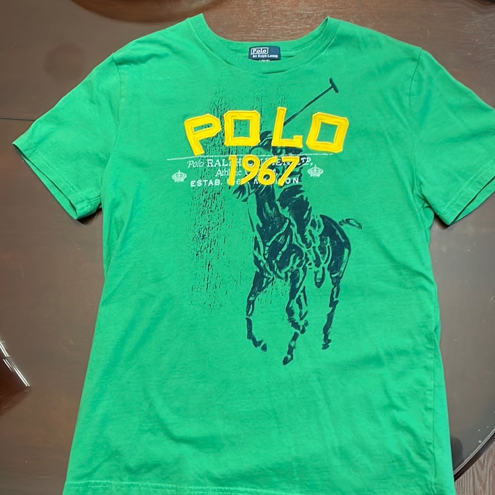 Polo Ralph Lauren short sleeve T-shirt. Words Polo and year are sewn on patches